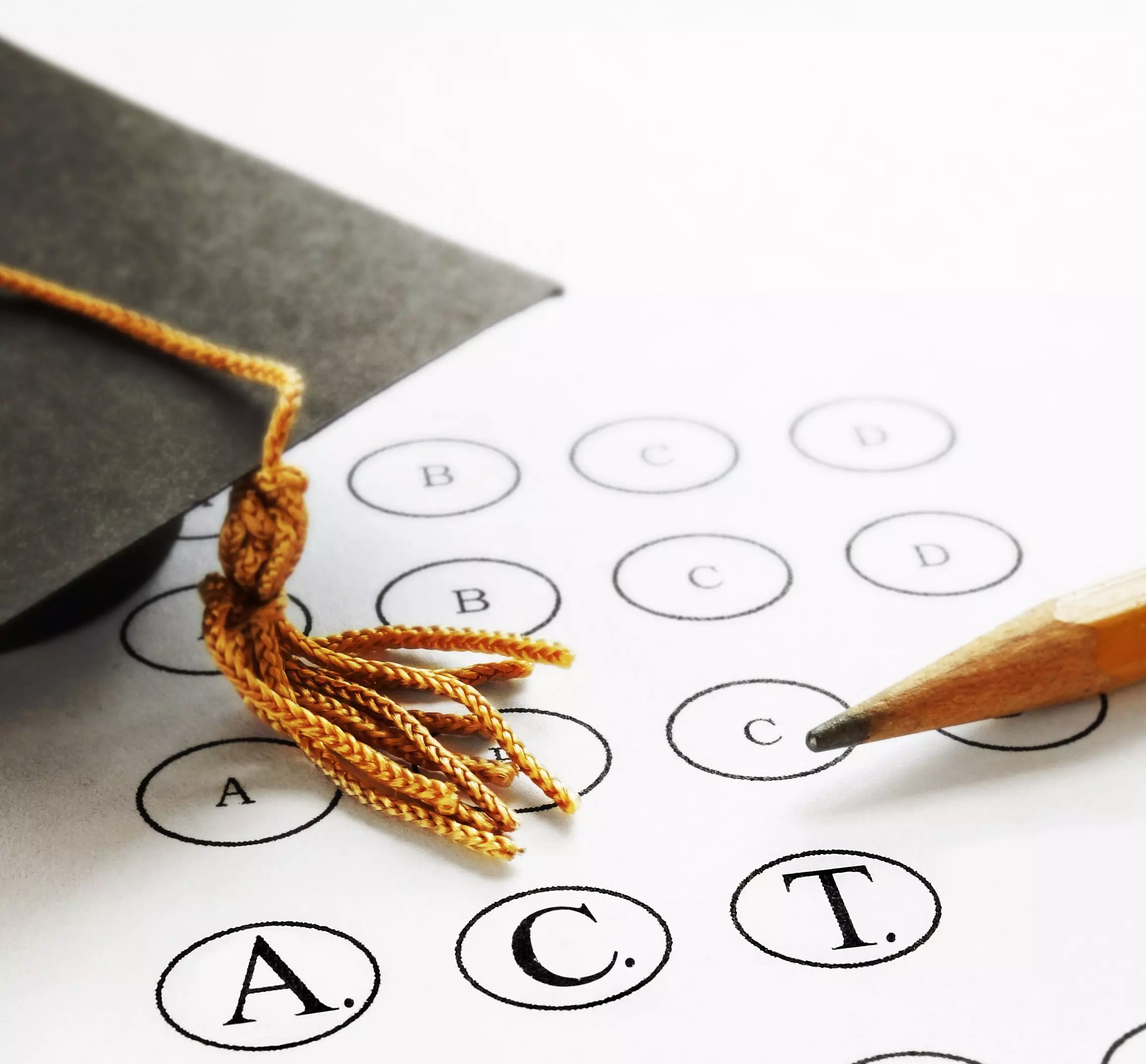 Image a graduation cap with the word ACT on it.