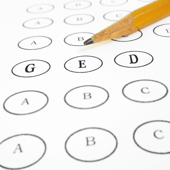 Image of multiple choice bubble sheet that spells GED.